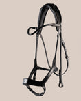 Load image into Gallery viewer, Black horse bridle on a beige background