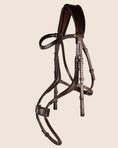 Load image into Gallery viewer, Brown leather horse bridle on a beige background
