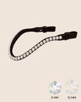 Load image into Gallery viewer, Black headstall with crystal embellishments on a beige background
