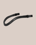Load image into Gallery viewer, Black leather strap on a beige background
