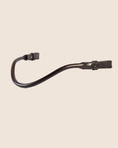 Load image into Gallery viewer, Black leather strap on a beige background

