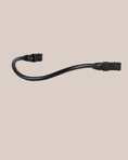 Load image into Gallery viewer, Black leather strap with buckles on a beige background
