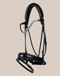 Load image into Gallery viewer, Black horse bridle with decorative elements on a beige background
