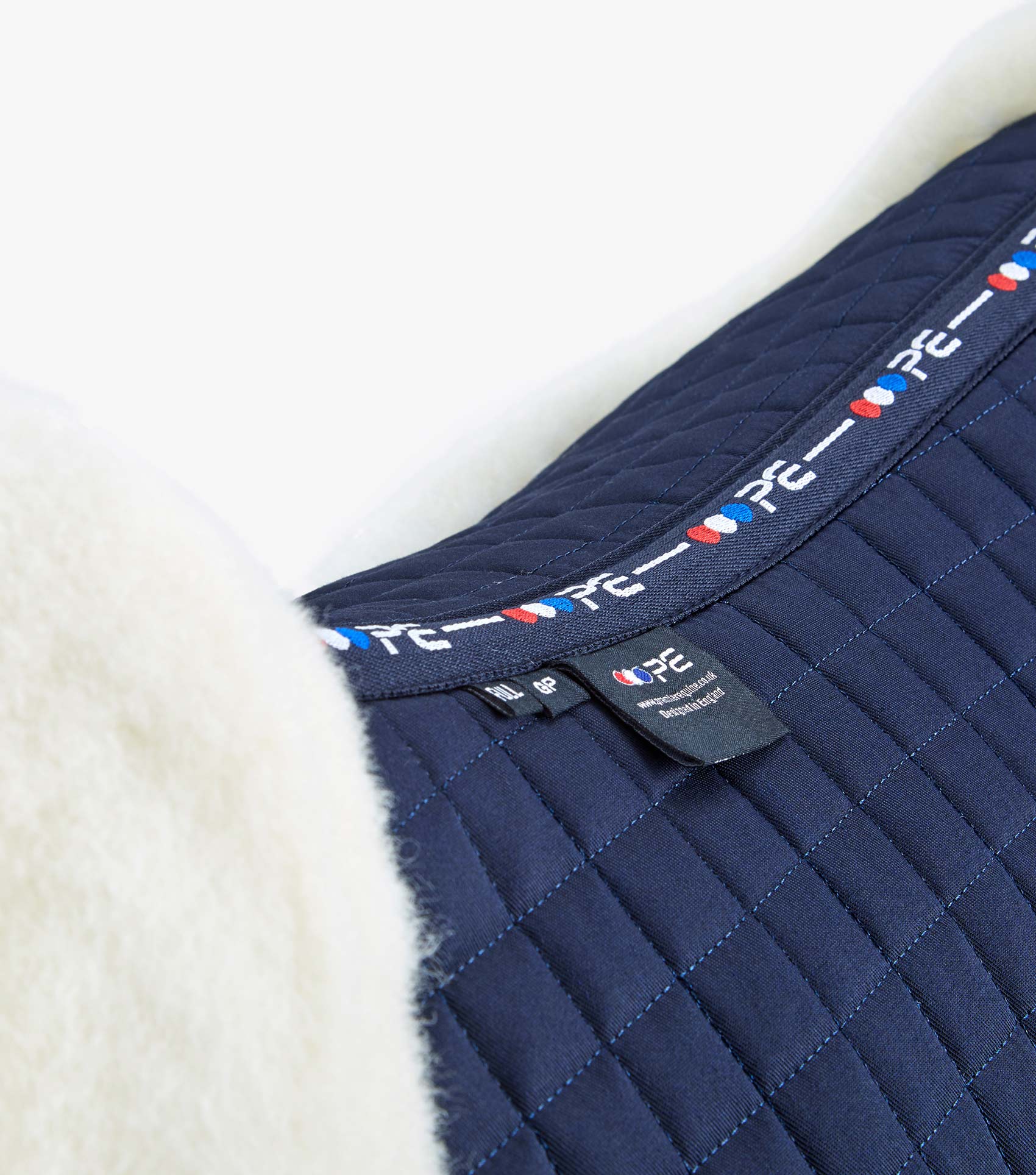 Description:Close Contact Merino Wool European Saddle Pad - GP/Jump Square_Colour:Navy/Natural Wool_Position:2